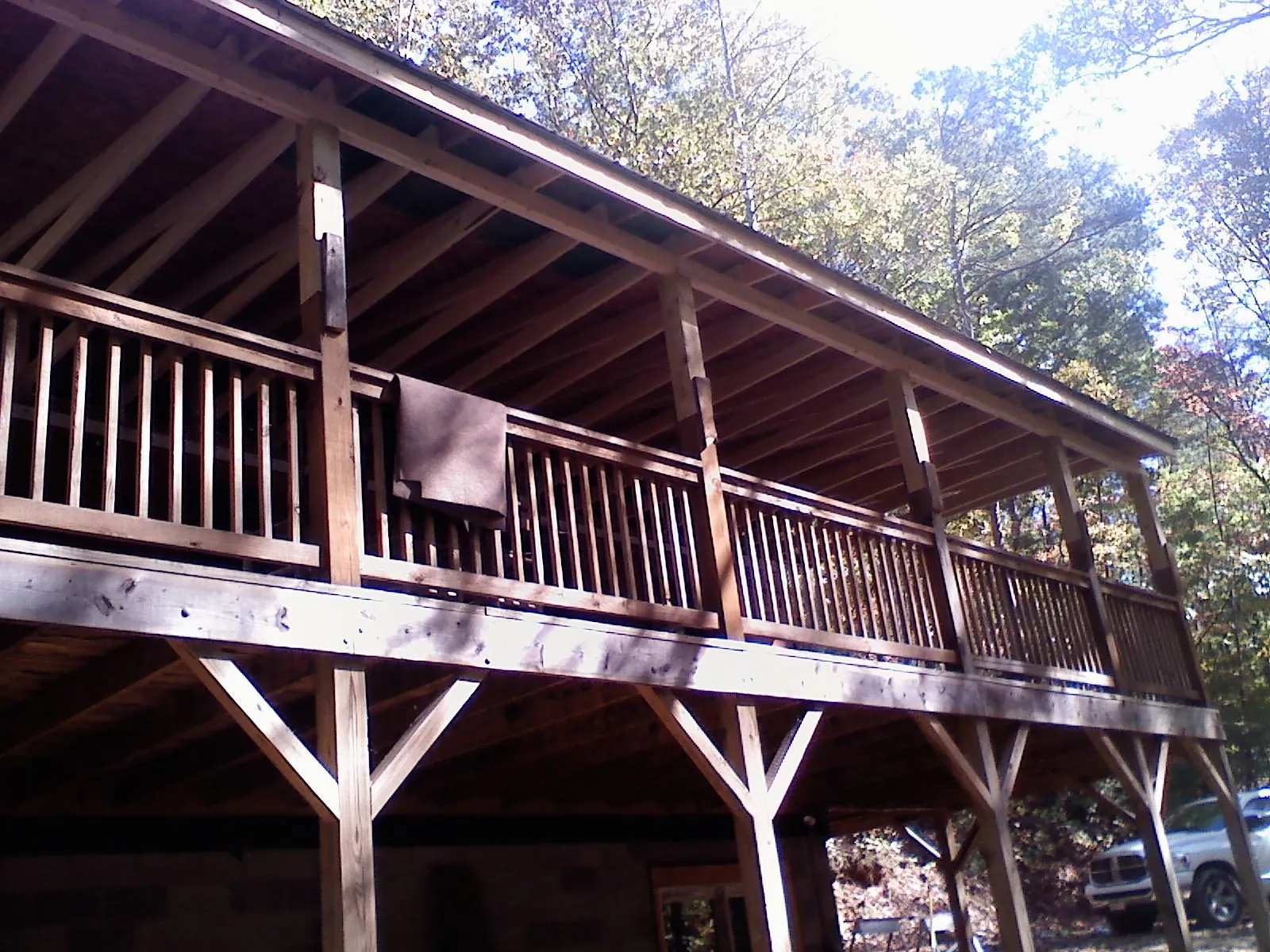 Timber framing under a new elevated porch and deck — Roof Leak Repair in Allenspark by Roofing Brothers